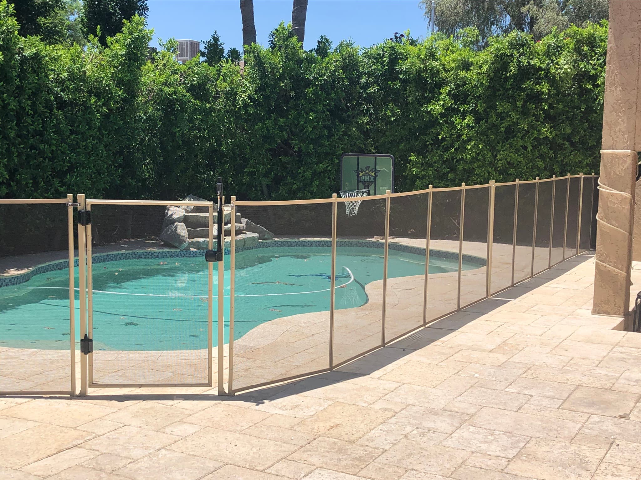 Beige pool fence