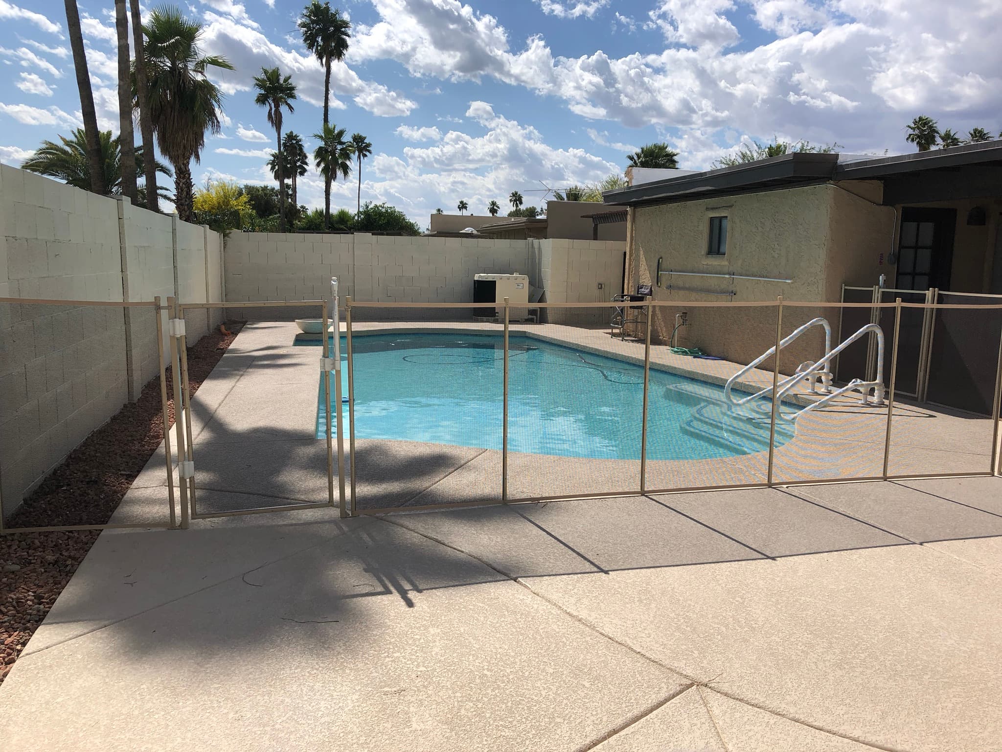 Black mesh pool fence — Gilbert AZ residential pool installation