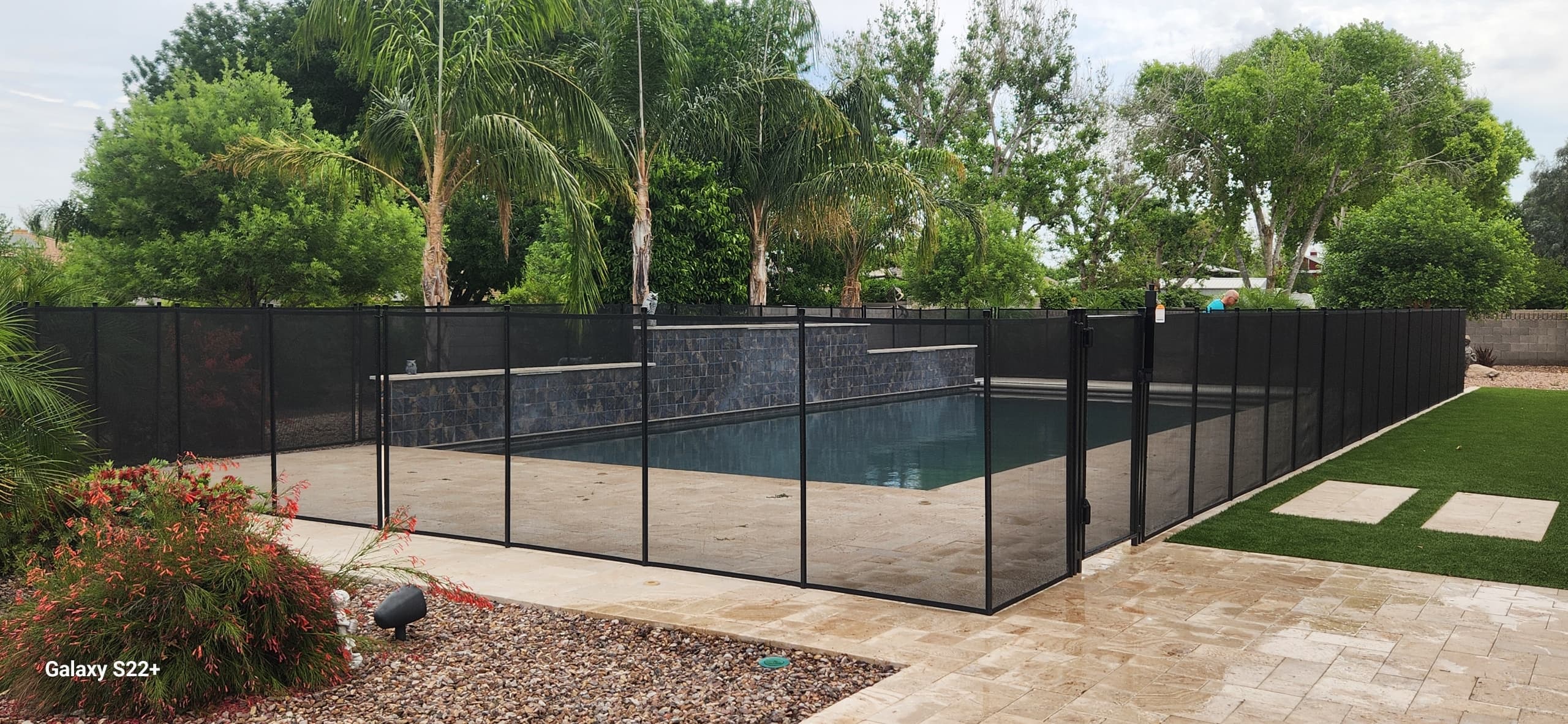 Full perimeter black removable mesh pool fence — professional installation, Arizona