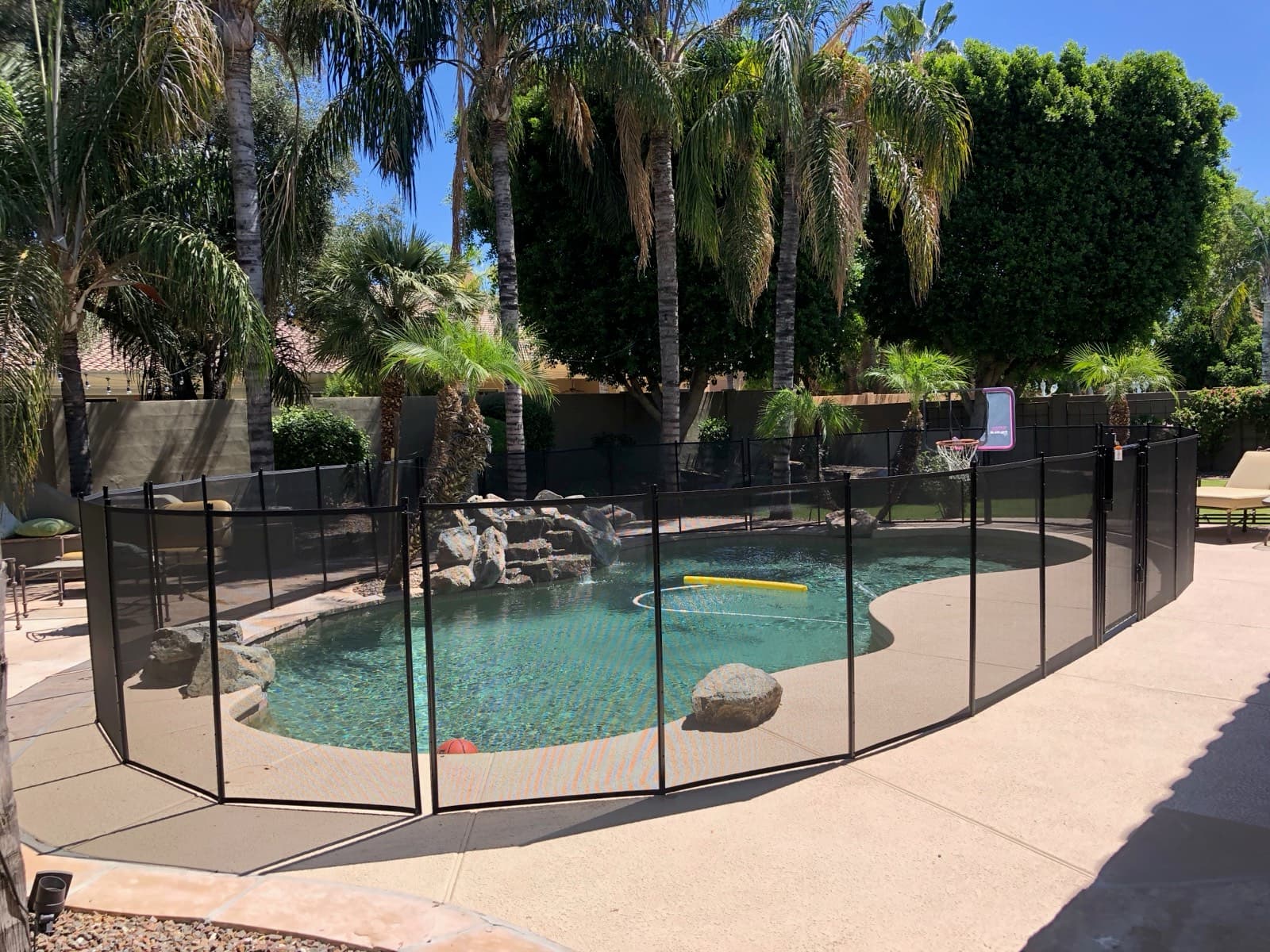 Removable mesh pool fence installation in Phoenix, Maricopa County AZ by Clear Choice Pool Fence